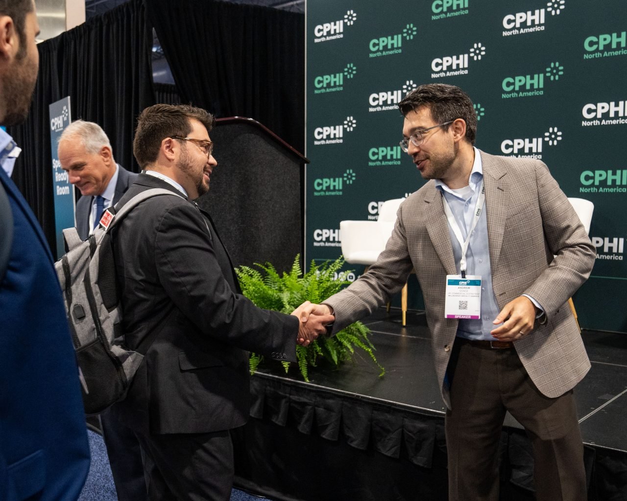 Male presenting on stage